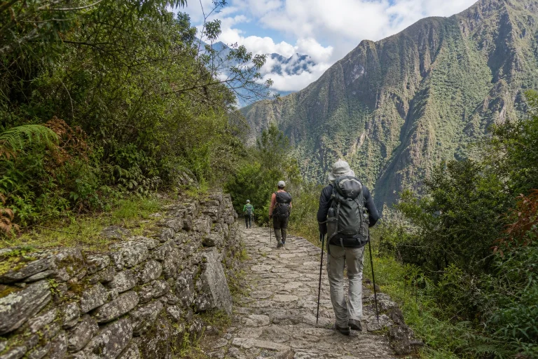 Hikers on the Camino Inka Km 104–Chachabamba route near Machu Picchu.
