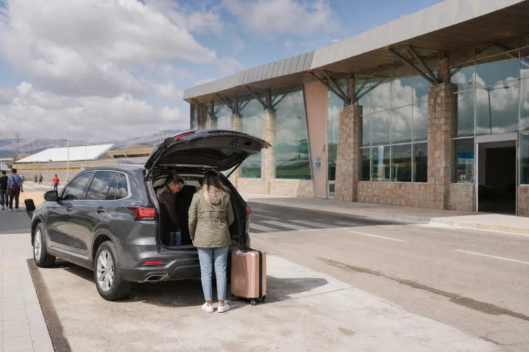 Transfer vehicle outside Alejandro Velasco Astete International Airport in Cusco