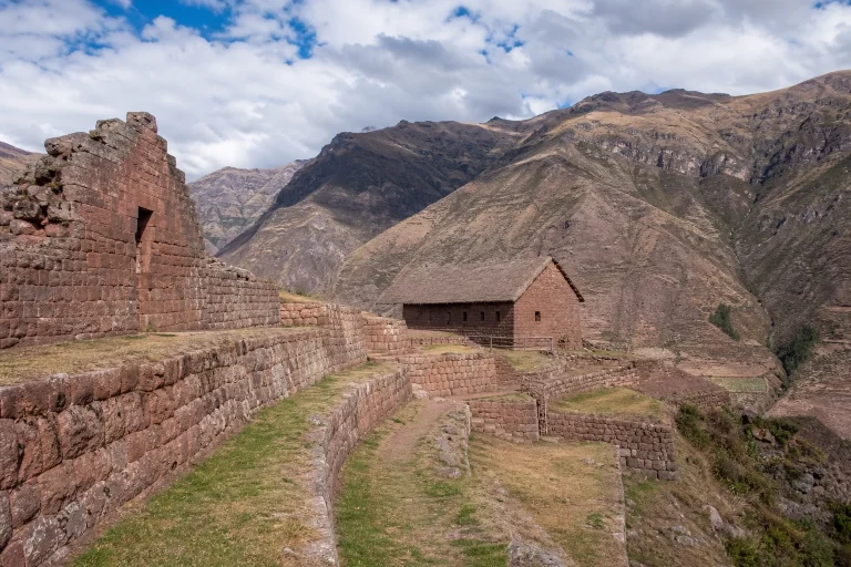 Stone archaeological structures at Huchuy Qosqo in the Sacred Valley highlands.