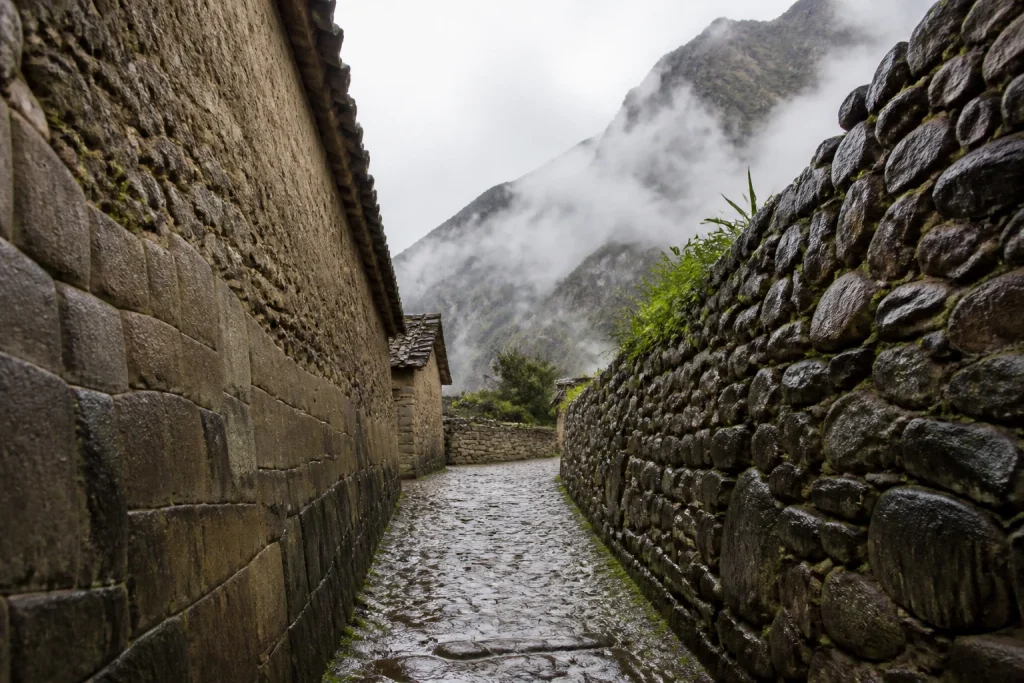 Rain-slick stone lane in Ollantaytambo, Sacred Valley