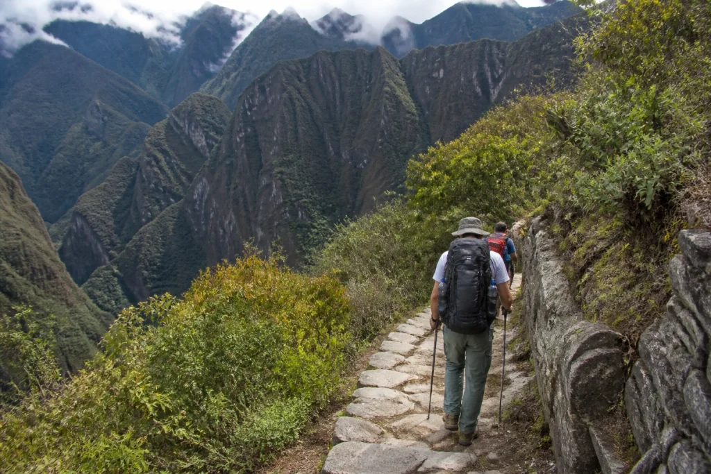 Hikers following a stone path on the Inca Trail in Peru