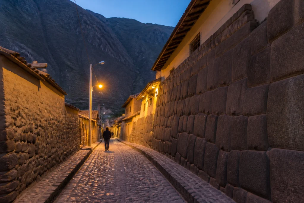 Historic public street in Ollantaytambo at dusk