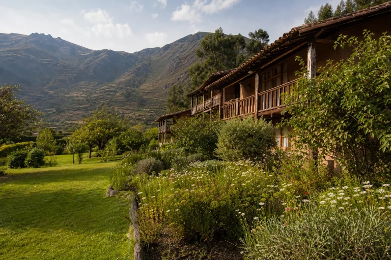 Las Qolqas Eco Lodge in a garden setting near Ollantaytambo in the Sacred Valley.