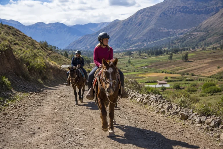 Horseback riders following an Andean trail in Peru’s Sacred Valley