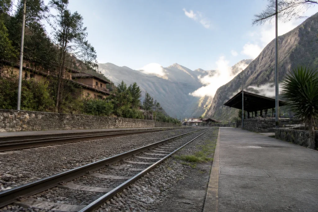 Railway tracks and mountain surroundings at Ollantaytambo station