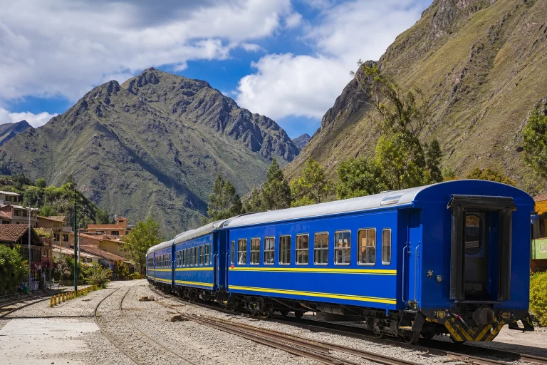 Passenger train travelling through the Sacred Valley near Ollantaytambo